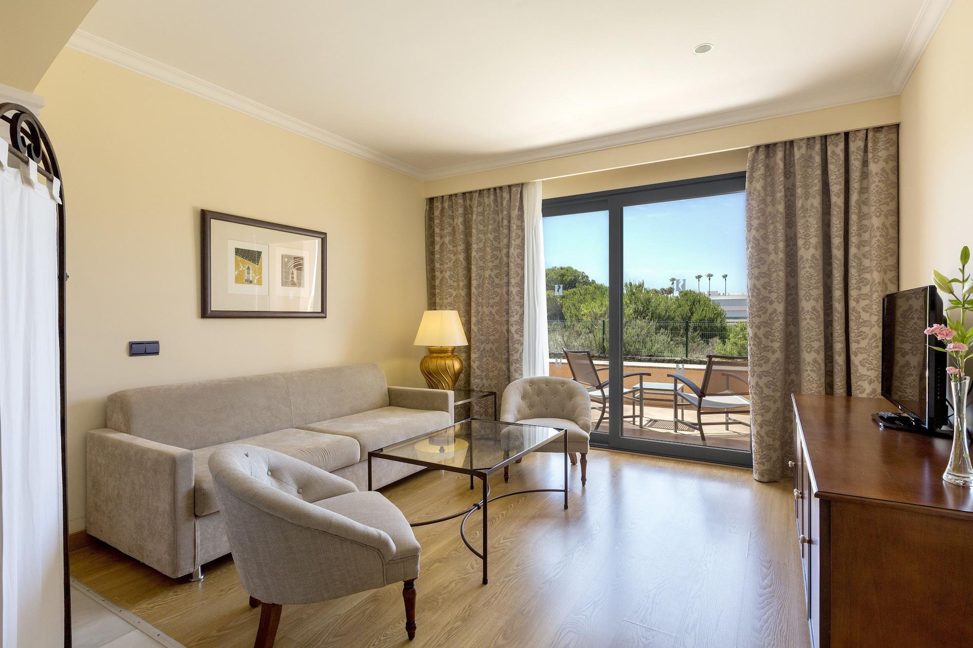 Hipotels Barrosa Palace & Spa Chiclana de la Frontera Extérieur photo A living room
